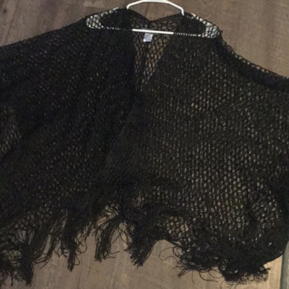 A lace and fringe shrug
